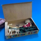 Santa Claus On Sled Windup Toy Celluloid Figure Metal Sled Made In Japan Vintage