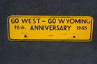 1965 Wyoming 75th Anniversary License Plate State Topper Go West - Go Wy