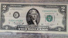 One 1976  Series Two Dollar   2  Bill    C  Philadelphia Pa  Bicentennial   M680