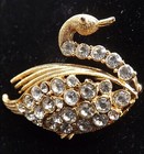 Vintage Crystal Blue Eye Rhinestone Bird Swan Textured Gold Tone Brooch Pin