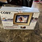     coby 7  Widescreen Digital Photo Frame With Mp3 Player Dp-767  never Used     