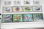 Worldwide 2000s Collection Of 650  Mint Stamps Stored In Harris Album