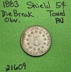 1883 Shield Nickel 5c Au Almost Uncirculated  Die Break Obverse