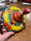 Vintage Pump Tin Spinning Top Toy Dutch Boy   Girl Skaters Lithograph C1950s