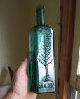 1860s Pretty Teal 10 1 4 tall Size Wishart s Pine Tree Tar Cordial Emb Pine Tree