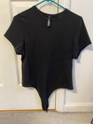 Skims Black Short Sleeve Thong Bodysuit In Size 2x