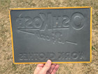 Original Oshkosh Work Clothes Embossed Painted Tin Sign