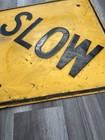 Vintage Yellow Slow Embossed Metal Road Highway Street Sign 24   