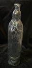 Vintage Virgin De Guadalupe  mary Mexican Glass Bottle Clear green 13in Bottle