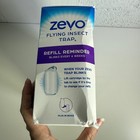 Zevo Flying Insect Trap Starter Kit  2 Devices   6 Refills New Open Box 