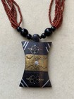 Vintage Ethnic Necklace - Coral Beads  Ebony Wood Pendant  Brass  silver Inserts