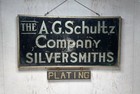 Early Original A G Schultz Co  Silver Reverse Painted Advertising Display Sign