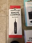 Canon Camera Accessory Lot Commander 58mm Filters Lp-e10 Charger Vivitar Flash