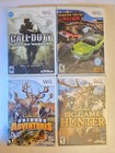 Nintendo Wii 4-game Lot  Cod Modern Warfare  Monster Trucks  Cabela   s Hunter
