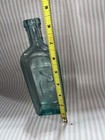 Antique Rawleigh s Medicine Bottle  Aqua Glass  Embossed  8  High  Vgc  