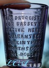 Antique Guaranteed To Cure Medicine Dose Glass Fully Embossed W   Amethyst Tint