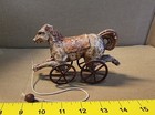 Vintage Composite Horse On Metal Wheels Pull Toy Antique Decor Figure