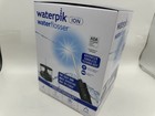 Waterpik Ion Water Flosser Compact Rechargeable Cordless 6 Tips Black New