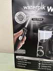 New Waterpik Ultra Water Flosser   Cordless Plus Set Travel Case   12 Tips Black
