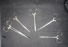                     5 Vintage Surgical Locking Forceps                      