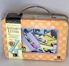 Togo Chipboard Patterned Alphabet Letters In A Windowed Tin K company Opened Box