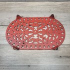 Red Cast Iron Footed Enamel Trivet  Hanging Ring Oval 10  X 6  Vintage