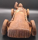 Cast Iron Michelin Man  bibendum  Rusty Race Car 10 Inches Long