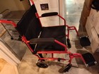 Medline Transport Wheelchair Lightweight Foldable Red Black Adjustable Footrests
