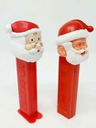 2 Santa Claus Pez Dispensers 1 Vtg No Feet 1976  1 2012 W feet Holiday Dispenser