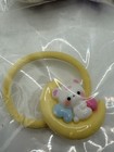 3 New Baby toddler girl Bears   Crocheted Flower Hair Ties  Yellow  Purple  Pink
