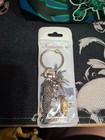 Singapore Souvenir Keychain  Silver And Gold In Color