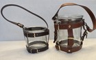 Set Of 2 Decorative Glass Bottles With Brown Faux Leatherstraps And Metalaccents