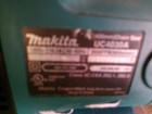 Makita Uc4030a 18in Electric Chainsaw 14 5 Amp 120v-ac  Q