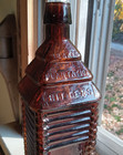 Scarce Arabesque Drakes Plantation Bitters 6 Log Cabin Figural Bottle Puce As Is