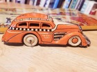 Vintage 1930 s Marx Tin Litho Orange Wind Up Tricky Taxi With Tin Busy Street