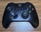 Set Of 2 Microsoft Xbox One Controllers  Black 1697   White 1708 See Description