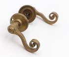Vintage Curled Cast Brass Lever Door Knob Set