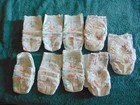 6 Target Up   Up Size 8 Diapers  3 Huggies Snug   Dry Size 7 Diapers  9 Total