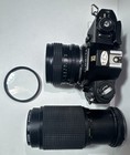 Nikon Em 35mm Slr Film Camera Black Body With Extra Lens Ships Asap