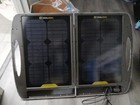 Small Generator With Handle With Solar Panel Suitcase To Power It 