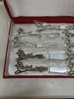 Set Of 9 Neiman Marcus Engraved Santas Reindeer Pate cheese Knives