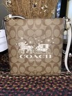 Nwt Coach Mini Rowan File Bag Signature Canvas   Leather Horse Sleigh Wristlet