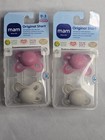 X2 Pair Of Mam Start Matte Newborn Pacifiers        X4 Total Sterilizing Pacifier 