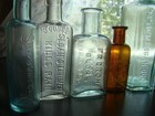 Antique 1880 s- 1890 s Embossed 10 Piece Lot Of Mixed Medicine   Product Bottles