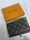 Louis Vuitton Monogram Passport Cover Brown