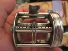Junk Drawer Lot Old Fishing Reel Old Coins Fancy Serial Number 1  Dollar Old