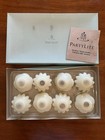 New unused Partylite Floater Candles Box Of 8 French Vanilla Flowers