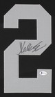 Marcus Allen Autographed   Framed Black Raiders Jersey Auto Beckett Coa