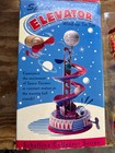 Nos Never Opened   Space Elevator Tin Wind Up Toy Schylling Collector Series
