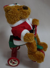 Avon 1997 Teddy Bear Cycling Santa Musical Animated Christmas Plush Red Tricycle